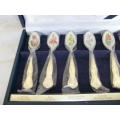 Boxed sliver plated set of six stunning enamelled with a flower scene