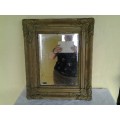 Heavy gold painted in color vintage wooden ornate wall mirror please note