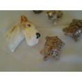 four collectable small ornaments .. dog head .. wade etc