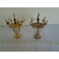 two small display metal lot of swords in a holder