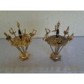 two small display metal lot of swords in a holder