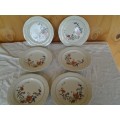 a set of six pretty floral porcelain little cake side plates