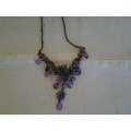 pretty metal necklace with purple