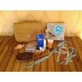 a nice ladies job lot selection of leather bag and some make up and perfume lot