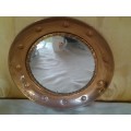 Round vintage copper wall mirror