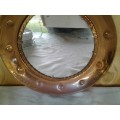 Round vintage copper wall mirror