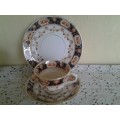A stunning vintage porcelain Mona tea cup trio