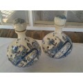a pair of decorated blue and white porcelain decanters ? display bottles