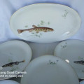 Vintage forgein porcelain fish scene platter and plates
