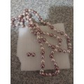 Stunning pink long pearl necklace with earrings