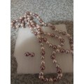Stunning costume pearls necklace and earrings