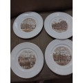 Four Wedgwood dinner plates