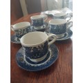 Five blue and white willow pattern procelain tea cup duos