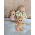Three assorted kewpie dolls
