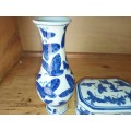 A combo of a blue and white trinket and vase
