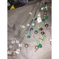 A lot necklaces and earrings