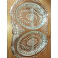 A sliver plated snack tray with glass inners
