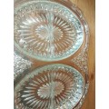 A sliver plated snack tray with glass inners