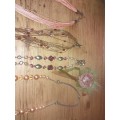 Four assorted costume necklaces