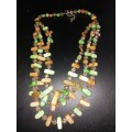 Three strand shell and crystal necklace