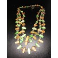 Three strand shell and crystal necklace