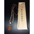 Stunning long beaded necklace with gem stone