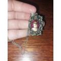 Vintage sliver booking  necklace with portrait pendant