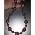 Glass purple foil beads