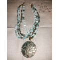 Well made three tear blue beaded necklace