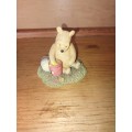 Collectable pooh bear with a honey jar ornament