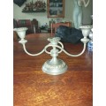 A sliver plated candle stick holder