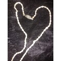 Thin pearl necklace with sliver clasp