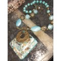 A nice blue beads with shell inside necklace