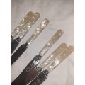 A set of six mother of pearl handled fruit knives