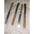 Set of four vintage fruit knives