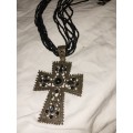 Costume cross pendant on ribbon necklace