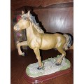 Vintage procelain horse on stand