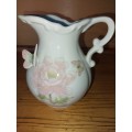 Decorative procelain jug with butterfly