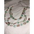 Three strand shell costume necklace