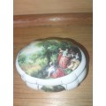 Decorative procelain trinket box on feet