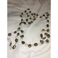 Long white and black pearl necklace