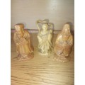 Three oriental figurines