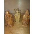 Three oriental figurines