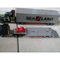 2 Articulated trucks, Sealand container truck and low loader