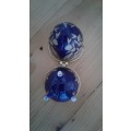 (NORR)A VINTAGE COBALT BLUE AND GOLD  PORCELAINE REPLICA HINGED FABERGE EGG with gold tone clasp.