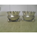 (DEr)  PAIR OF SILVER PLATED  FOOTED  MAPPIN and WEBB OPEN SALTS opening4cm, 3.5cm height incl feet.