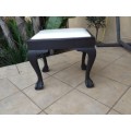 Black and white ball and claw piano seat