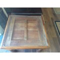 Old Indian door side table with glass insert