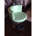 Funky retro lime green swiveling tube chair