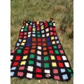 Black with coloured blocks long crochet blanket